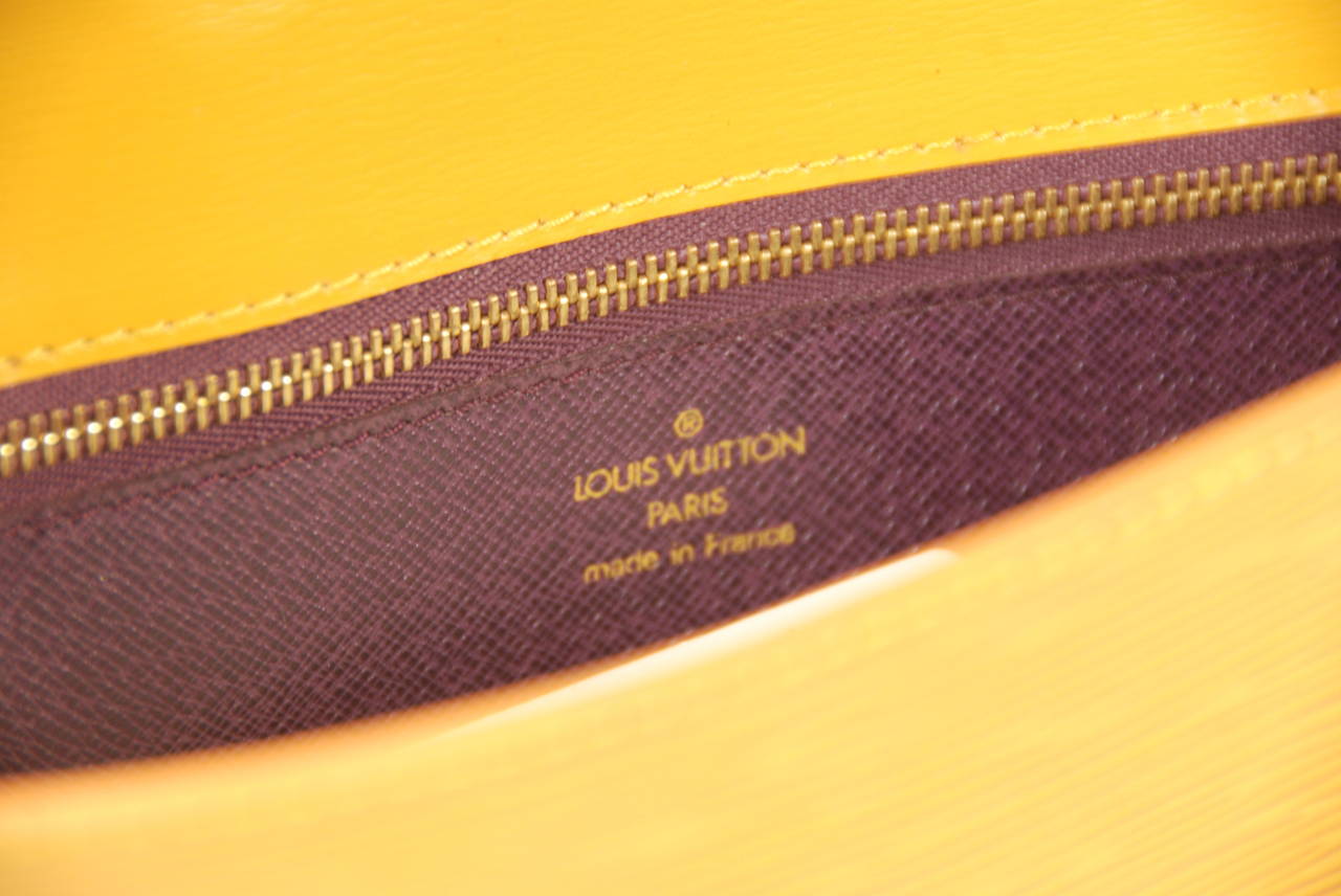 Louis Vuitton Mustard Yellow Epi Leather Arche Clutch 2