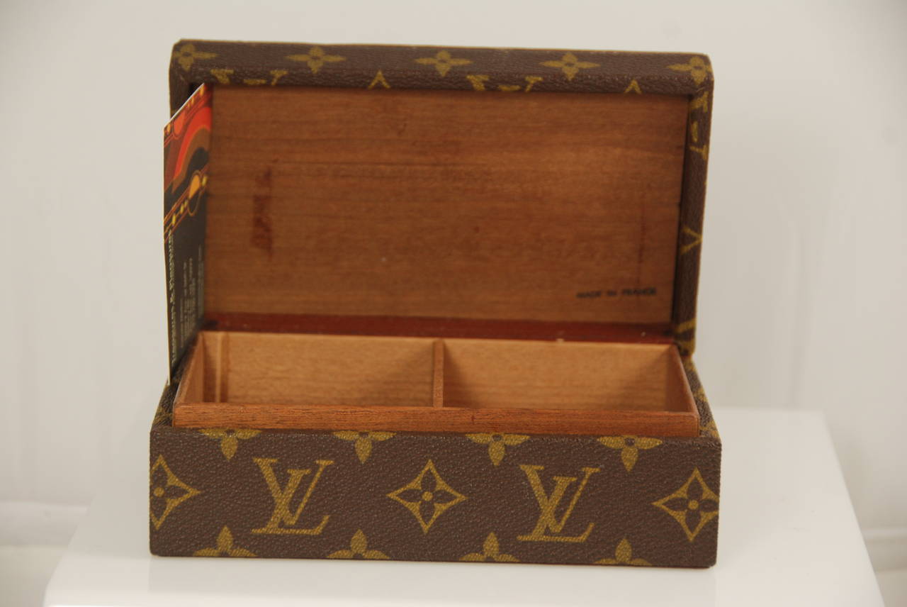 Louis Vuitton table top box covered in the LV monogram canvas. Seller told me that they purchased this box at the Vuitton boutique in Bonwit Teller (a high end NYC department store which closed in the 1980s). Originally this was meant to be a box