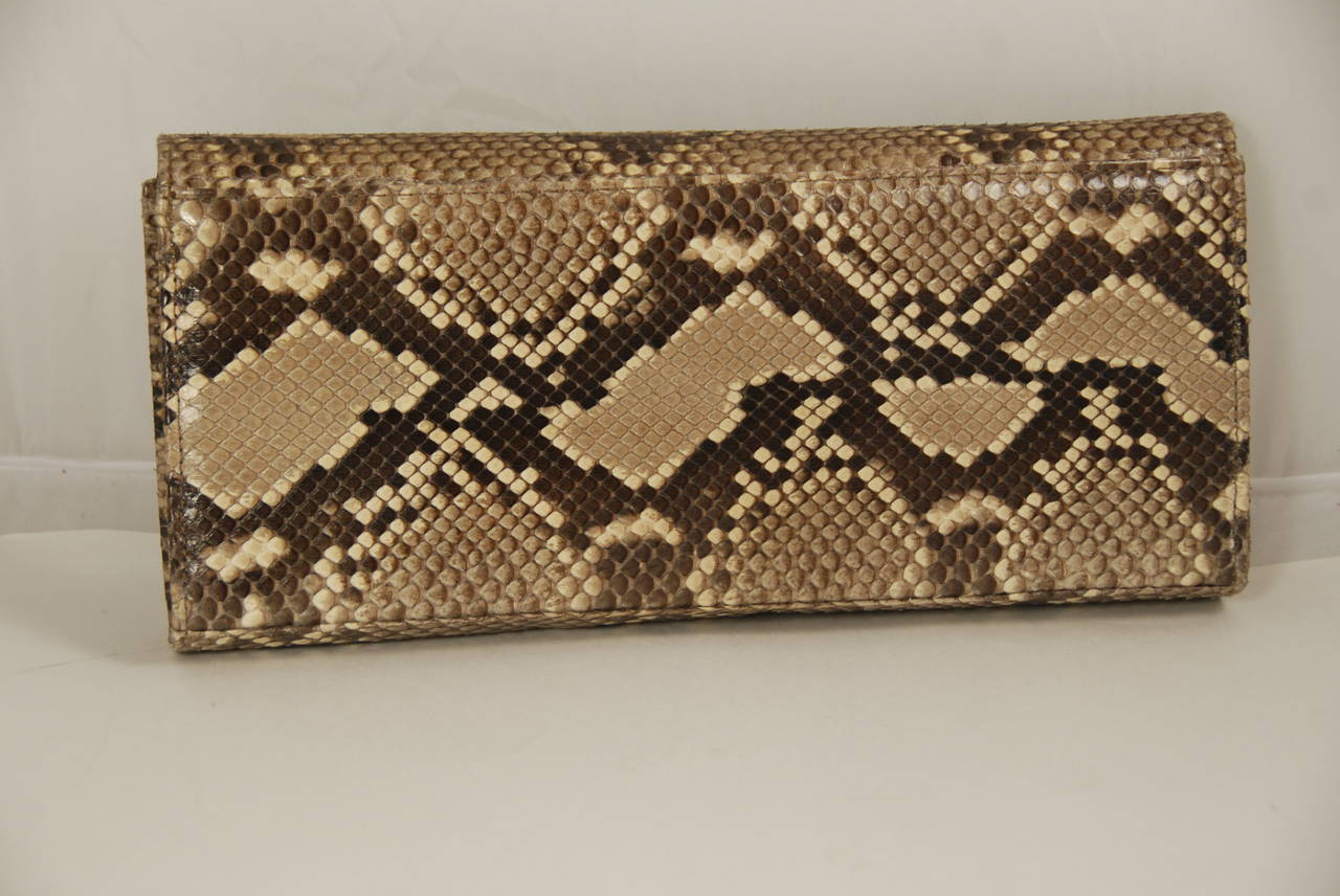 Beautiful snakeskin clutch by Lai. Lai was a store in New York City that made high quality handbags for their own store and private label bags for stores such as Saks and Neiman Marcus. They also supplied the exotic skins for the Judith Leiber