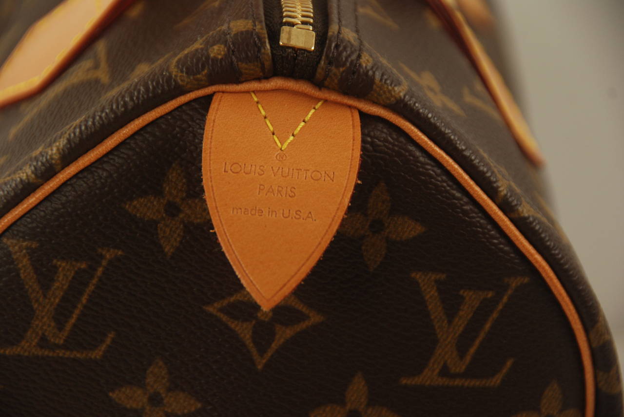 Louis Vuitton Speedy 25 in unused condition. Original owner received as a gift and never used it. Comes with LV lock and keys. Rounded handle and trim in natural cowhide leather.