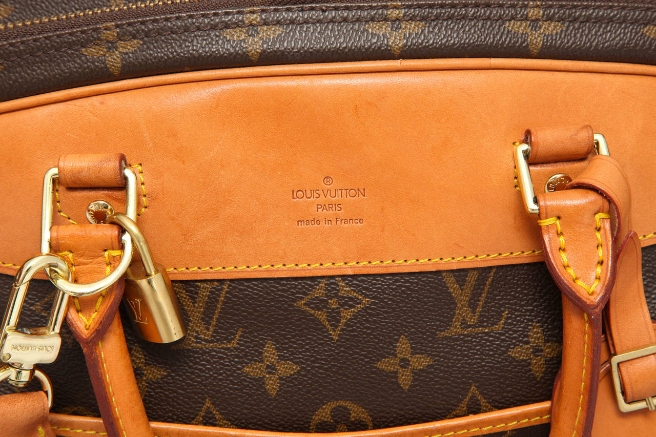 Louis Vuitton timeless classic carry on bag from the 1980s and large enough for those overnight trips. This item was given to the person I purchased it from as a wedding gift in the 1980s. Looks like the piece was rarely used, There are two main