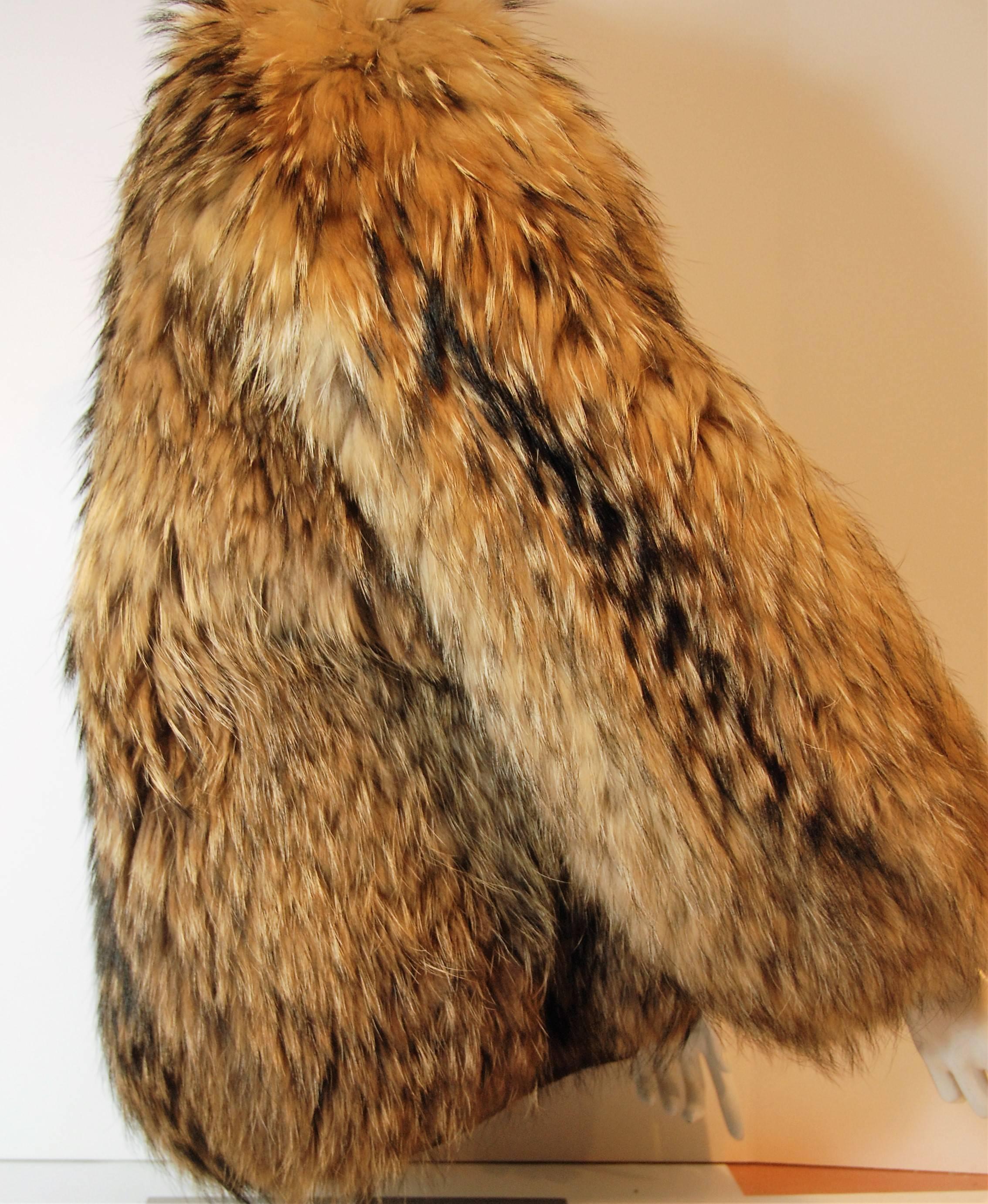 Fabulous Hermes tunaki fur jacket.  Extremely lush and fine furs. The matching of the pelts is done extremely well. There is brown knit ribbing for the closure and along the base of the jacket, and at the wrists, giving the fur a sportier feel,