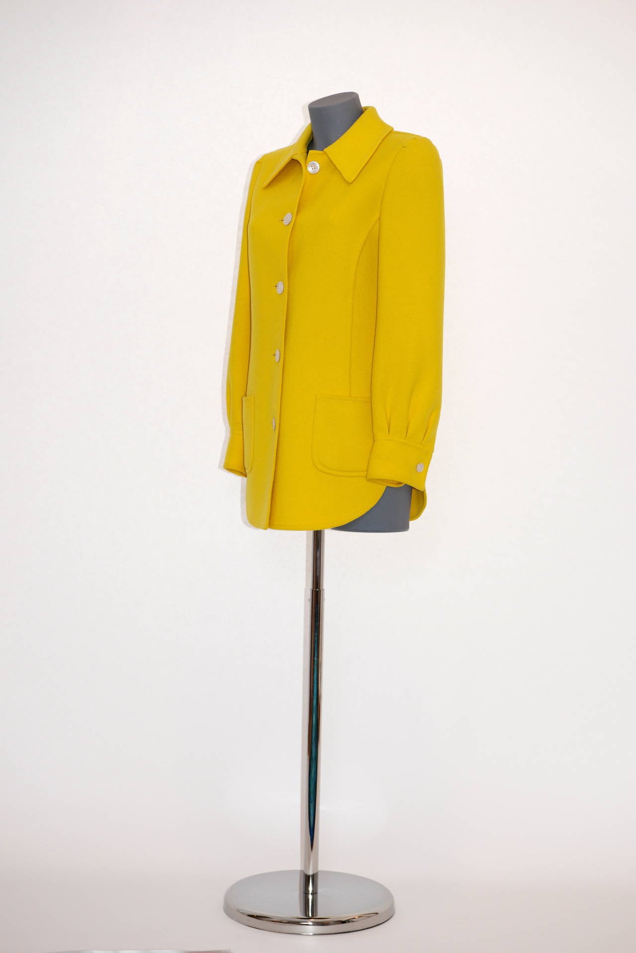 Rare early double face 70's bright yellow Valentino shirt-jacket. Typical 70's pointed collar and front patch pockets. The jacket fastens with five mother-of-pearl buttons. Unlined. Truly a fabulous and unusual piece of outwear, thanks to both its