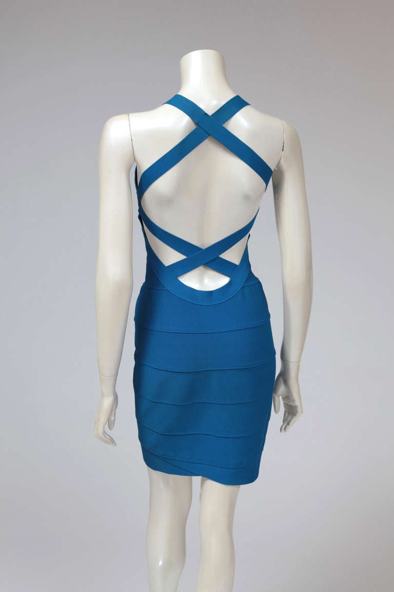 This couture royal blue zip-front tailored bandage dress (c. 1998) is a signature from the designer Hervé Leger. Each strip is hand-stitched for a form-fitting/figure-hugging finish. Here the model is too thin but this dress is made to mold and