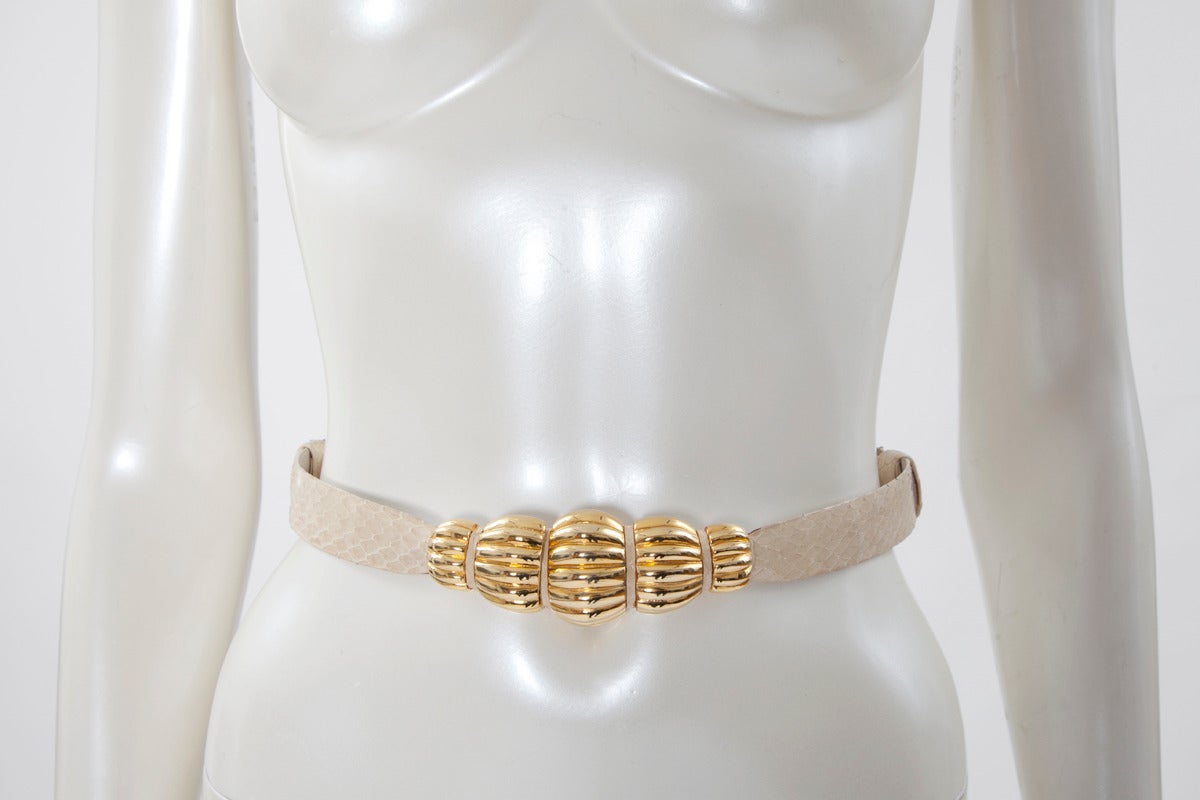 Adjustable Judith Leiber off white snakeskin belt with engraved gilt metal 
