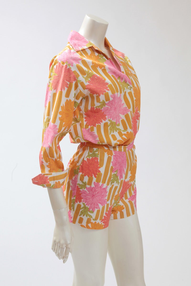 Charming 60’s Pucci cotton ensemble, consisting of a shirt and a high waisted matching mini shorts. Lovely peonies print. Labeled a size UK 12, the shorts run very small to size (but they can be enlarged thanks to the available material inside).
