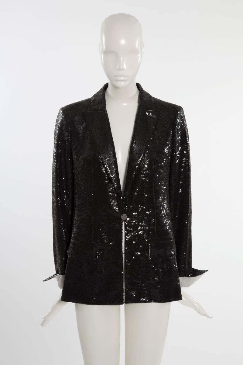 From the 2009 Cruise collection, this Chanel all-over black sequins blazer is the epitome of the 