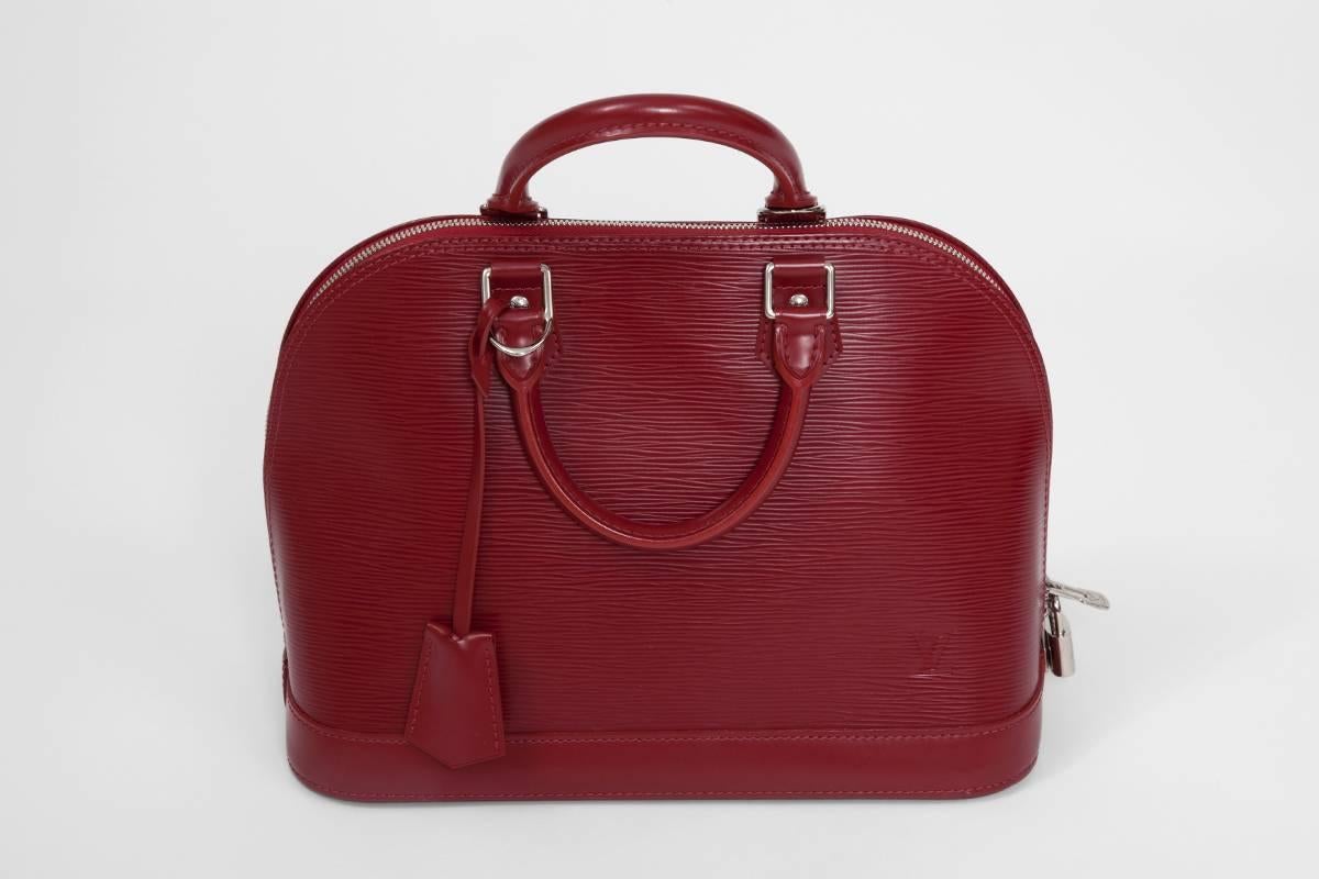 Nearly New Louis Vuitton Alma Handbag  In Excellent Condition In Geneva, CH