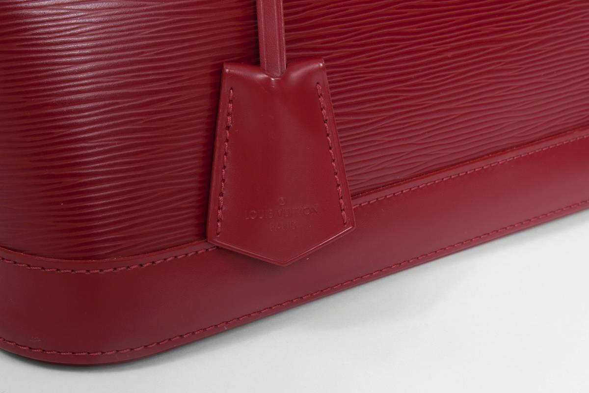 Nearly New Louis Vuitton Alma Handbag  1