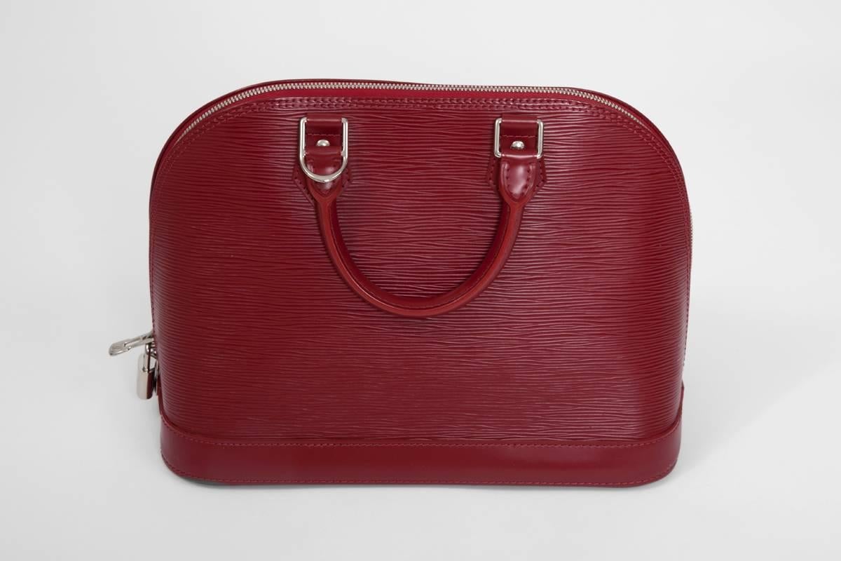 Nearly New Louis Vuitton Alma Handbag  3