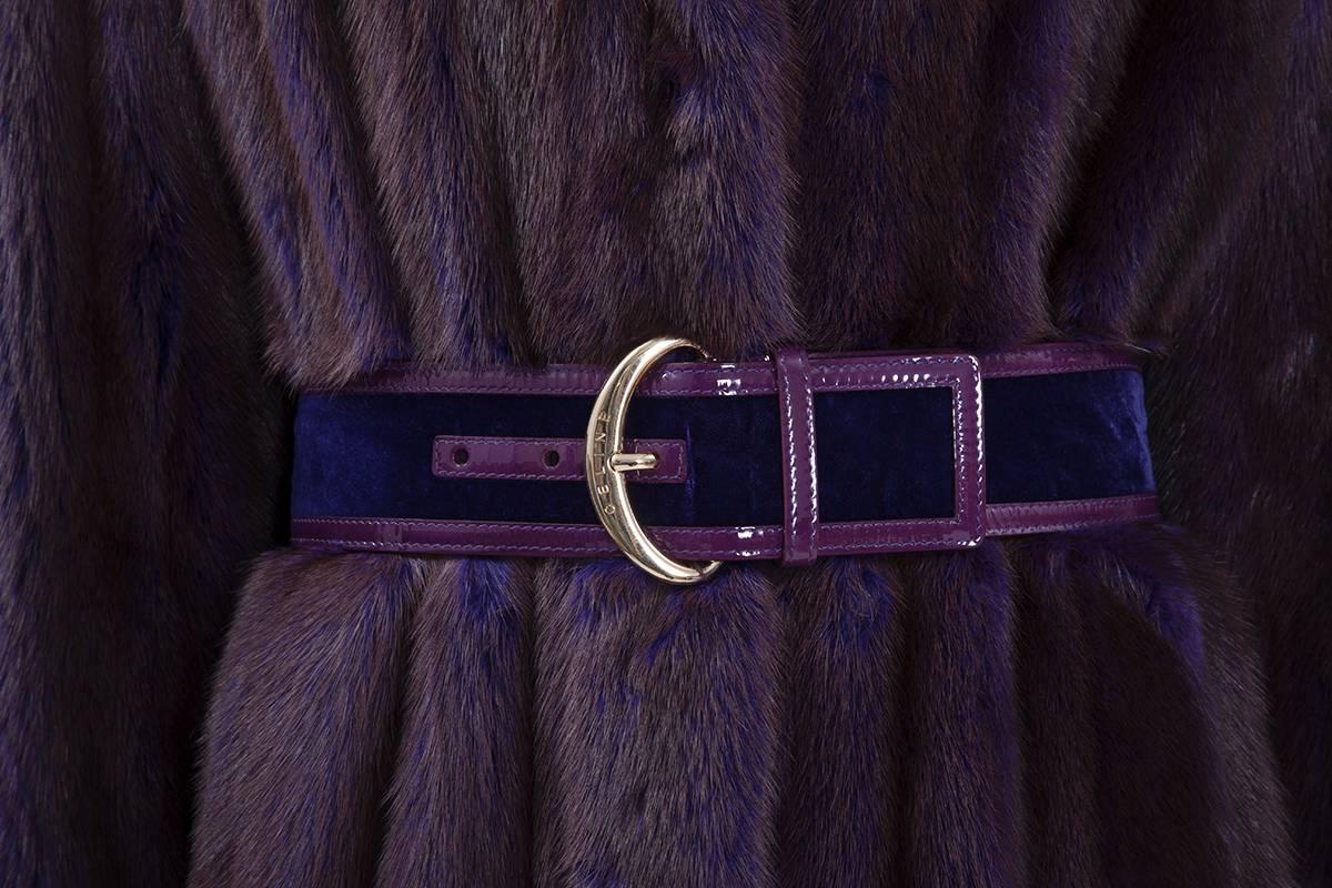 From the Céline Fall-Winter 2005-2006 ready-to-wear collection, this unusual soft mink coat is part of the look number 10 of the fashion show (see picture 10). The colour of this precious piece is eggplant but at the lower part of the fur, the hue
