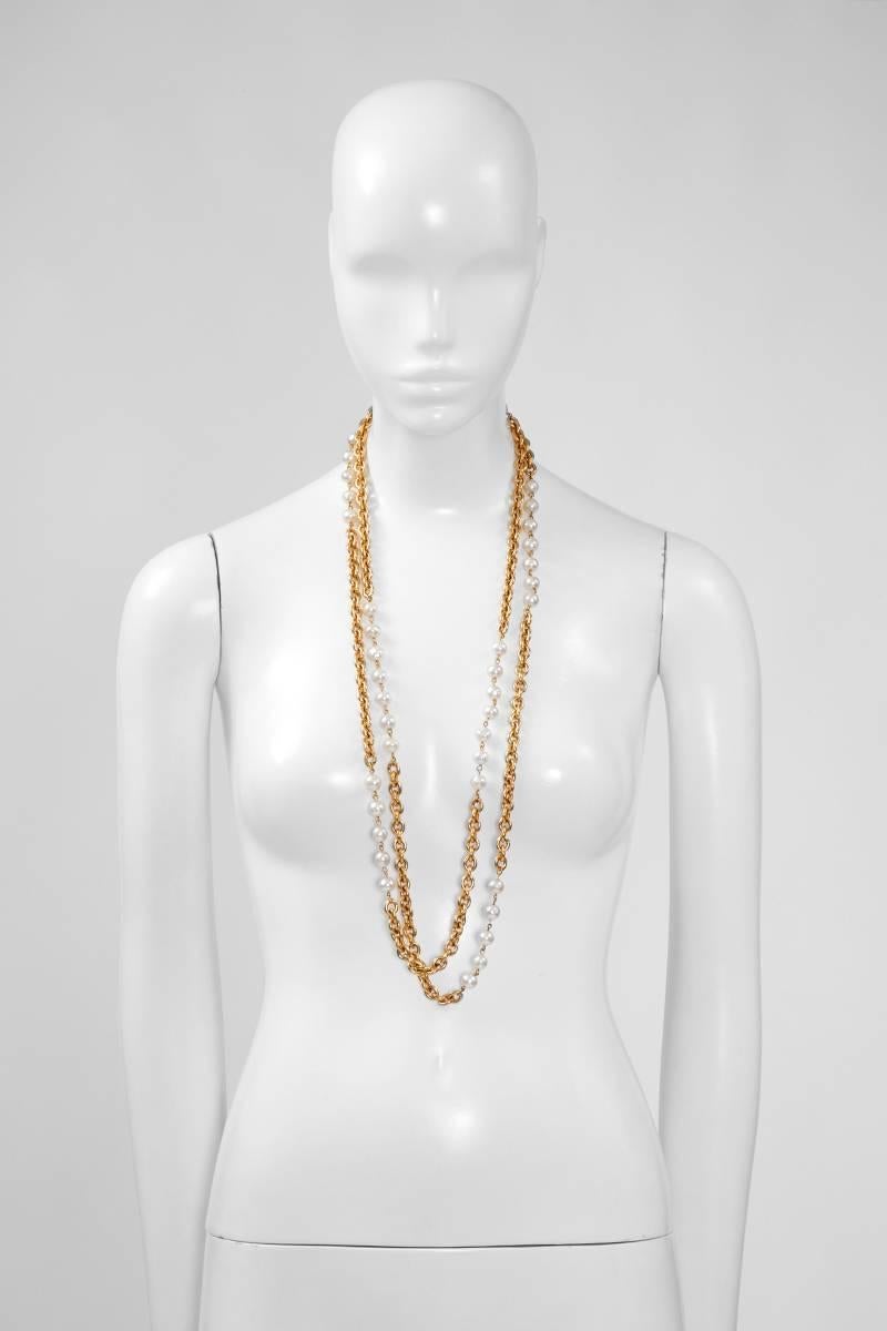 Similarly to the little black dress or the tweed jacket, the long-length necklace represents an important part of the stylistic heritage of Coco Chanel. This late 70’s - early 80’s Chanel piece is therefore a Chanel classic. Made of two separate