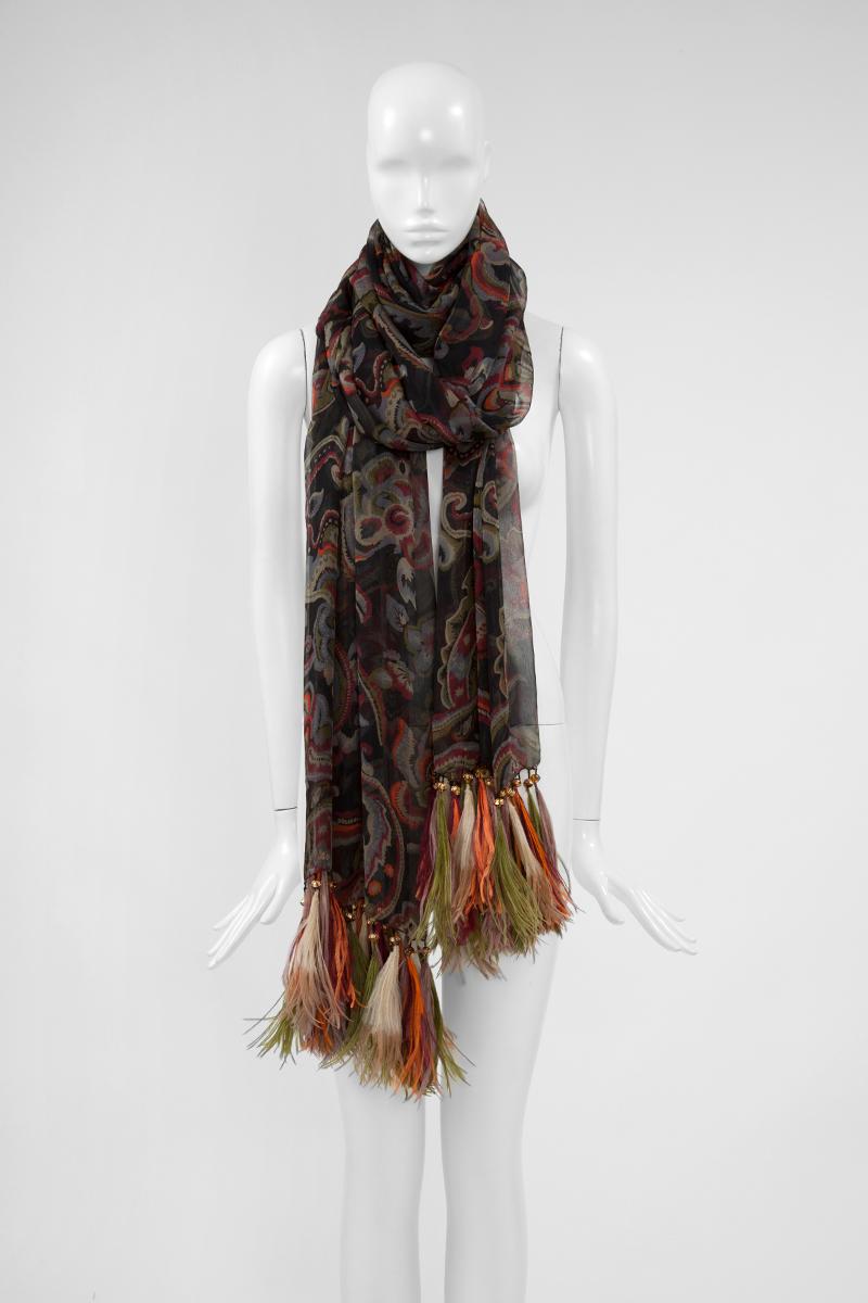 Probably by Yves Saint Laurent, this ravishing vintage silk chiffon scarf stole is embellished on both ends with gilt metal and faux amber beads, gracefully enlightened with coloured ostrich feathers. Paisley print in beautiful shades of orange,