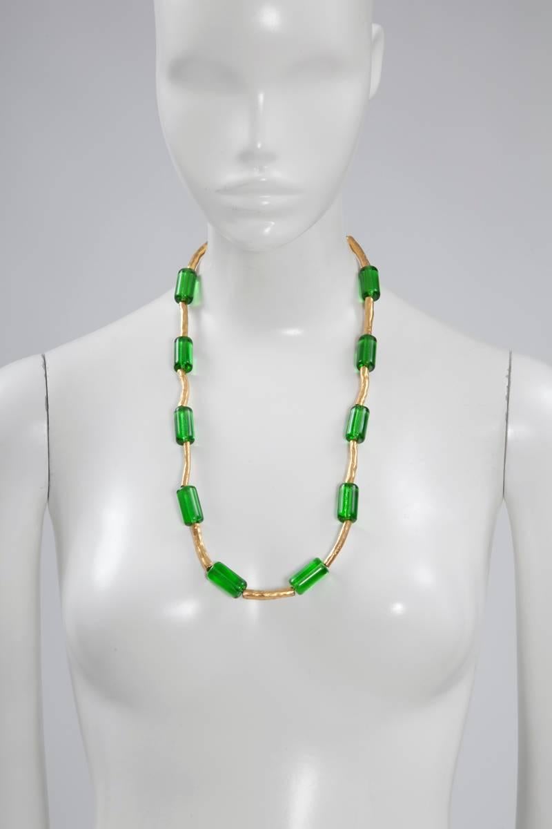 Unusual and rare 80's signed YSL hammered gilt metal and green glass necklace. This fantastic piece will make a cool yet chic addition to day and evening looks alike.

Dimensions : 
Overall length approx. 62.5 cm (24.6 inches) with three possible