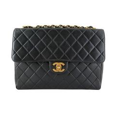 Chanel Jumbo 12inch Black Lambskin Classic 2.55 Flap Bag