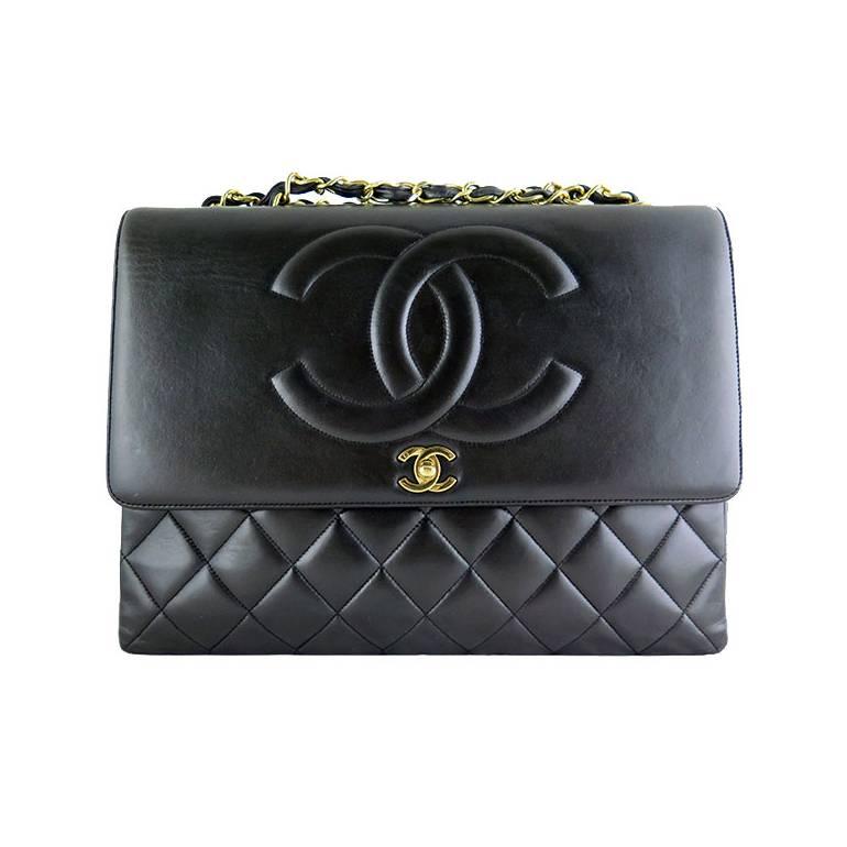 Chanel Maxi Jumbo Black Lambskin 2.55 CC Evening Flap Bag For Sale