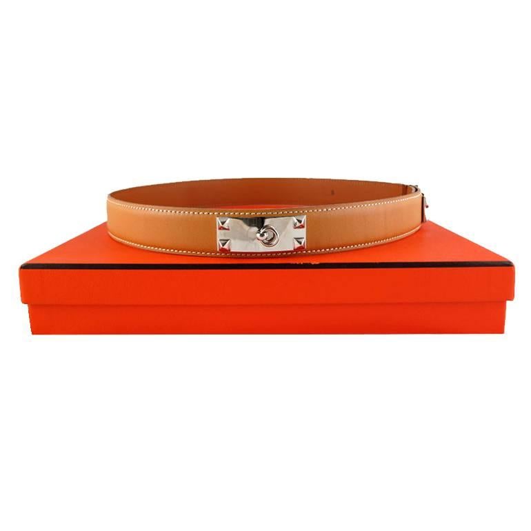 This is the belt version of the popular Hermes collier de chien bracelet. Rarely available in thinner version. It can be worn as a high waist belt, or accessorized with your favourite Hermes cadena. Features 5 adjustable sizes (smallest clasp 27inch