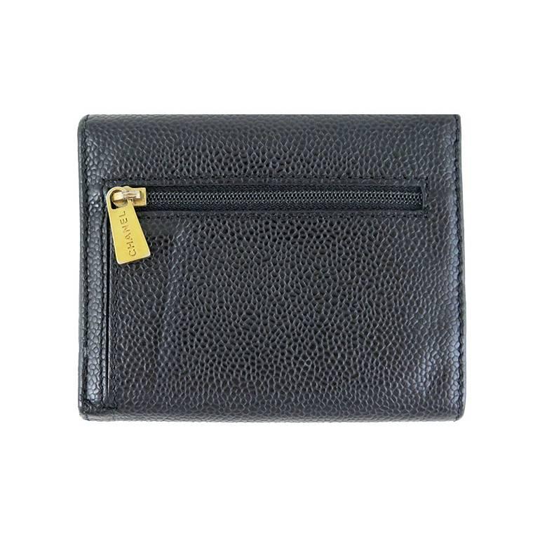 Caviar leather is very durable hence there are no visible stains or scratches on the exterior. Interior is clean. Features 3 credit card slots, 1 billfold pocket, 3 side compartments, 1 coin pocket and 1 zippered back pocket. Use it as it is or wear