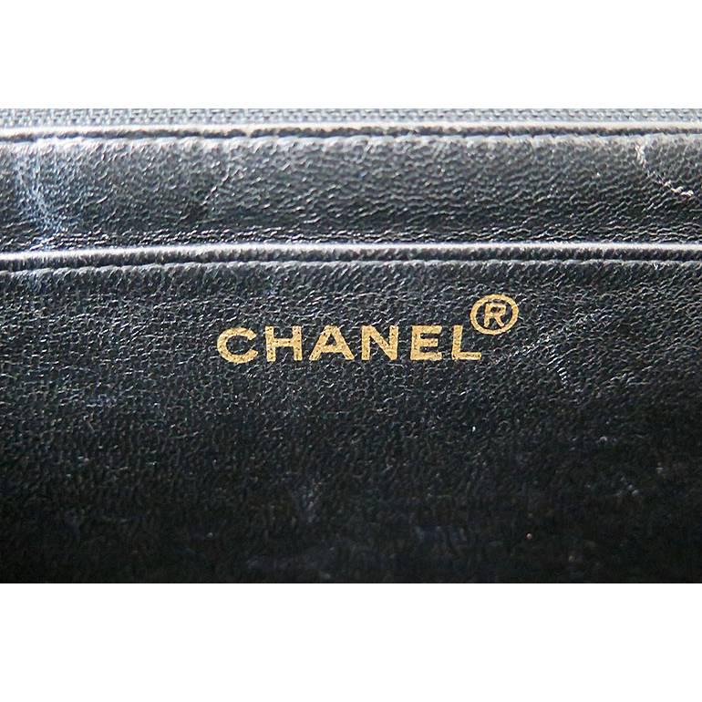 Women's or Men's Chanel Jumbo 12inch Black Lambskin Classic 2.55 Flap Bag For Sale