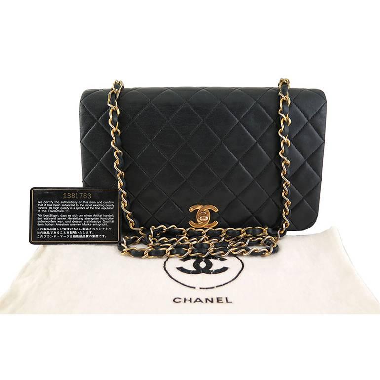 This piece comes with original Chanel dustbag and authenticity card. The chains can be worn long across the body or doubled on the shoulders. Some fading is present on the gold chains. No wear is seen on the leather straps. Interior is clean.