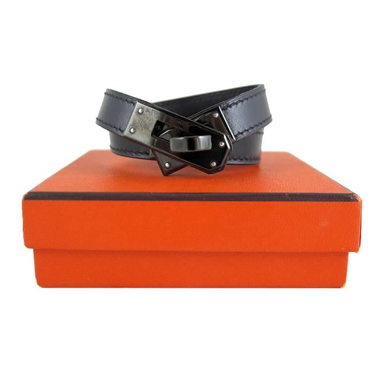 Rare collector's item that was sold out everywhere. Own a so black kelly double tour to complete the look with your so black kelly/birkin bag. This piece comes complete with Hermes box and is in excellent condition. Blindstamp N in a square. Size M.