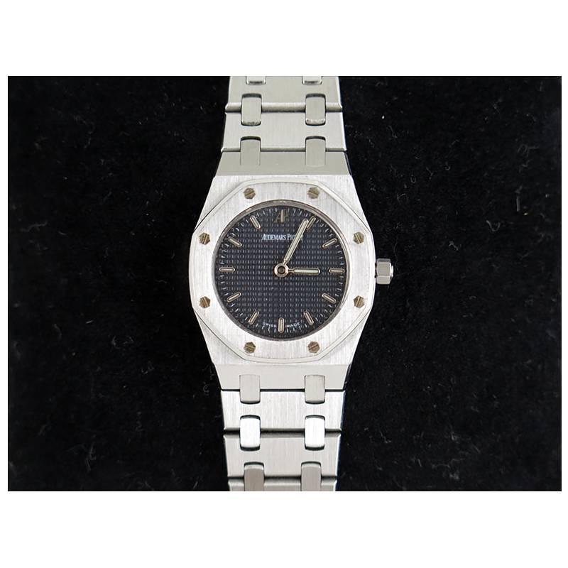 This piece has been discontinued.  It is no longer available in stores. It is in excellent condition with almost no scratches and keeps time well.

Serial No. : E84066
Functions : Hours, minutes
Case Material : Stainless Steel
Case Finish :