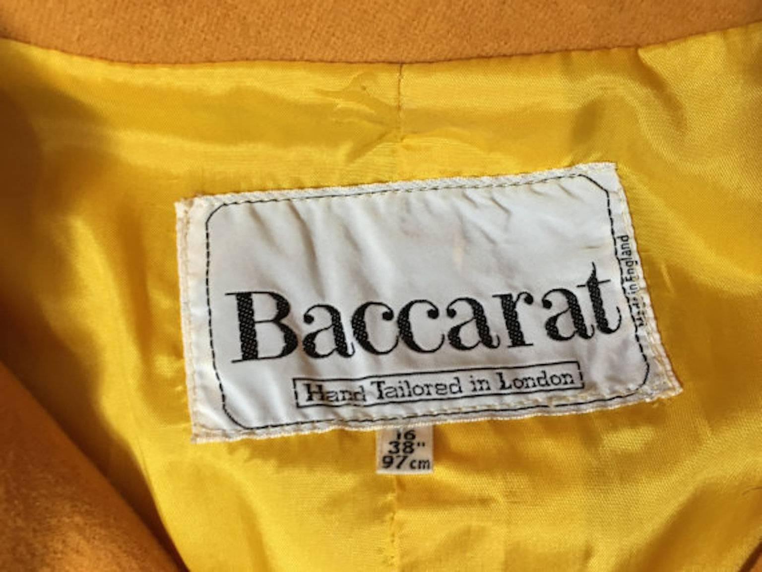 1970s Baccarat Bill Gibb Era Yellow 100% Wool Coat. Made from wool and leather trims, has toggle buttons and tie waist belt. Fully lined.

Size UK 10/12 Measuring 19.5 inches across bust, 16.5 inches across waist and 48 inches length

Excellent