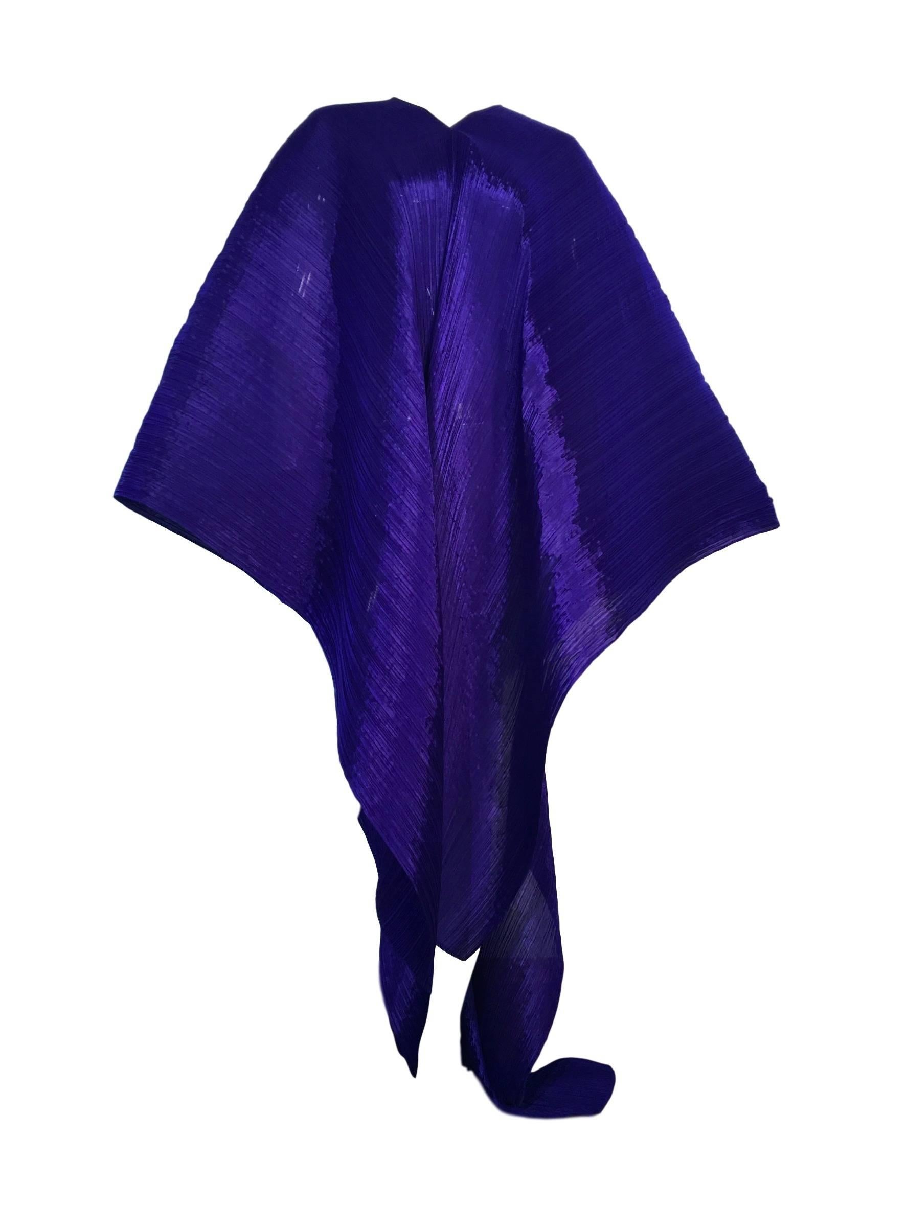 Pleats Please by Issey Miyake multifunctional wrap/cape/dress. Electric blue micro pleated polyester. 

In excellent condition

Made in Japan

Open Sizing - One Size Fits Any

Measurements:

Length 78" at it's longest, Width 74"

All