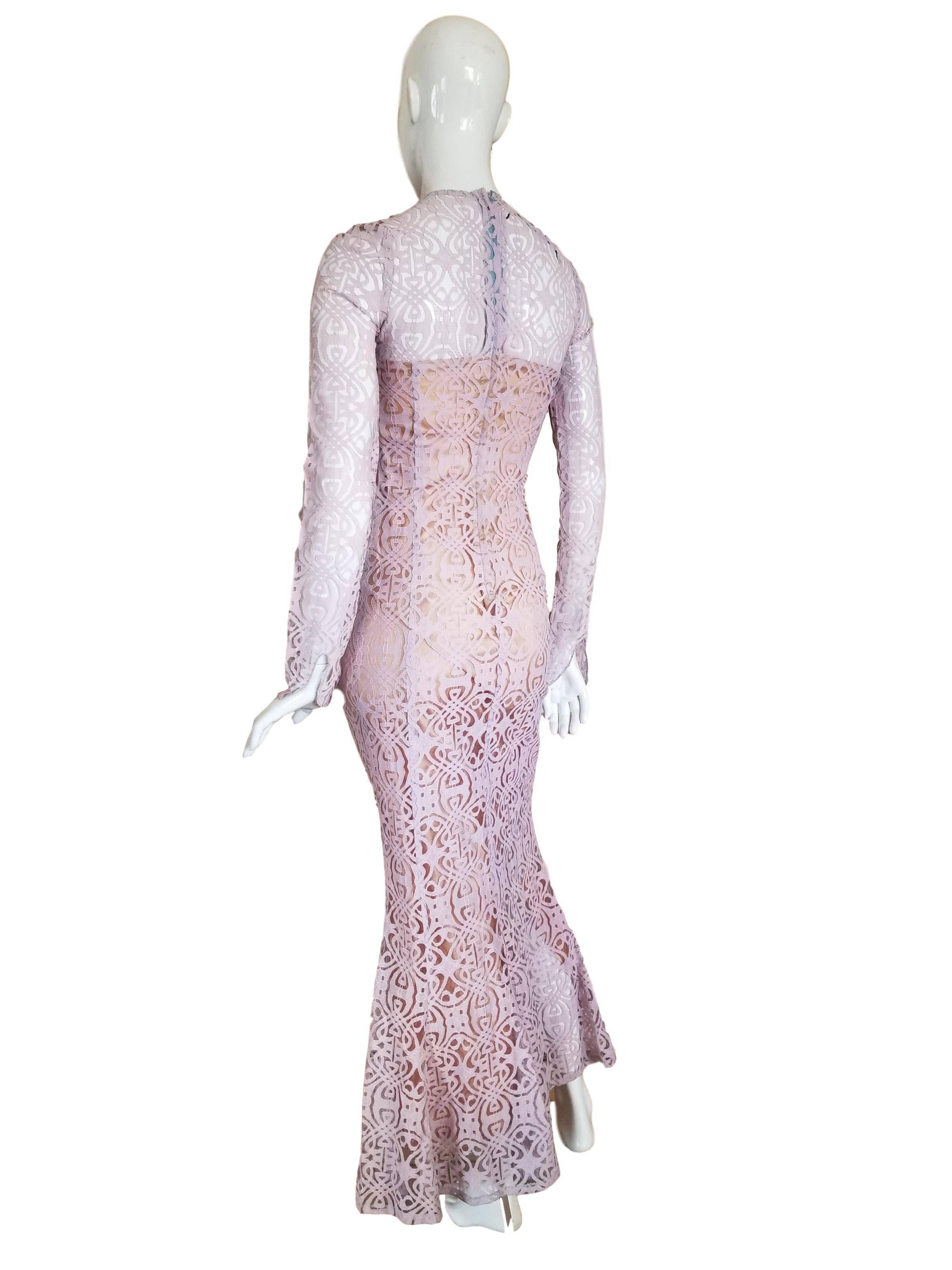 Original vintage Biba wedding dress 
Bought and worn once in 1969 by the bride. 
Gold lining with lavender lace in Biba Nouveau design. Metal back zip. 
Excellent condition 
Measures just over 16 inches across chest and 58 inches length