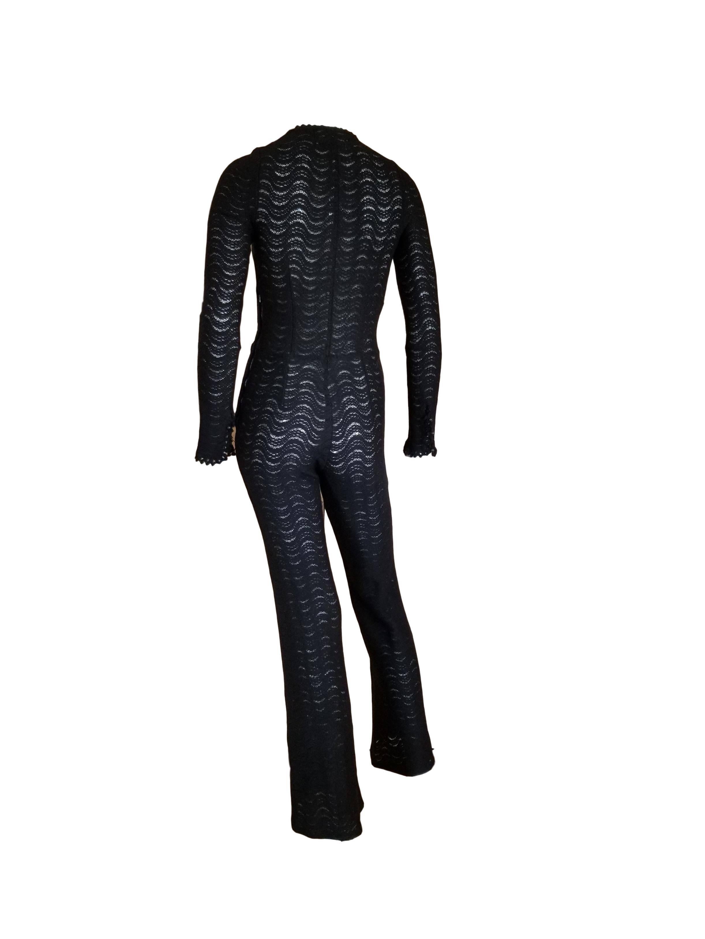 Late 1960s Biba Crochet Jumpsuit. So sexy with button front and side Metal zip fastening.  Bootcut leg and skin tight all over the rest. 
Excellent condition with a couple of minor breaks to crochet. A little stretching on a couple of the button