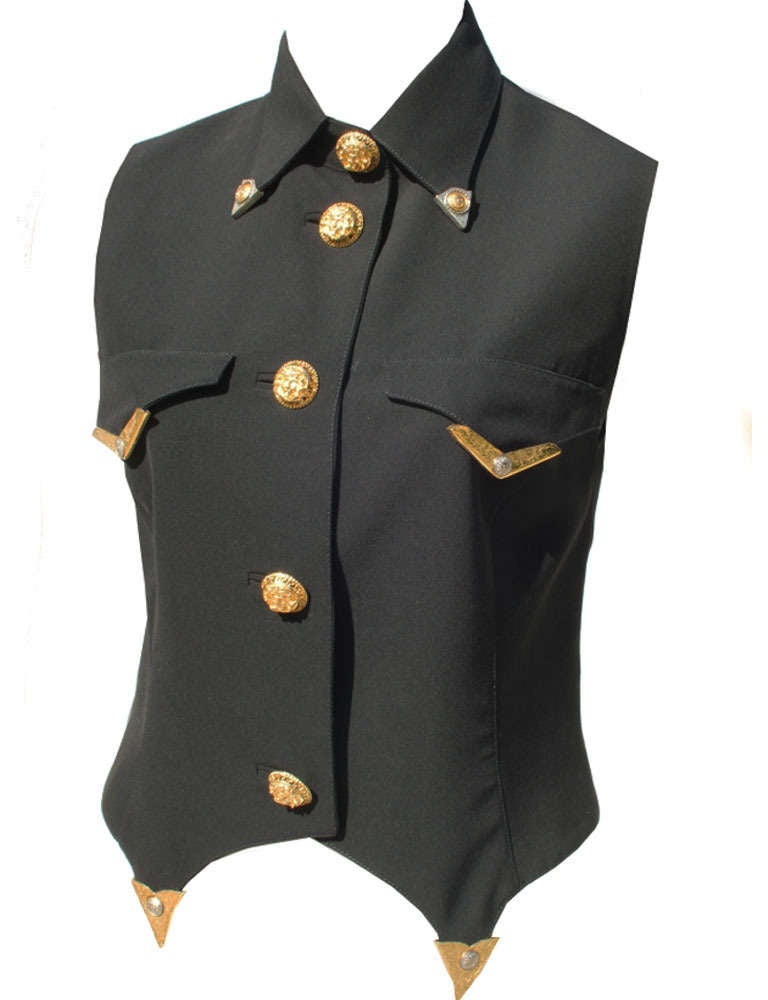Gianni Versace Cowboy Western waistcoat from the Autumn/Winter 1992 collection.

Marked an Italian 40.

Manufacturer - Alias S.p.a.

Fabric Content - 100% wool with metal application