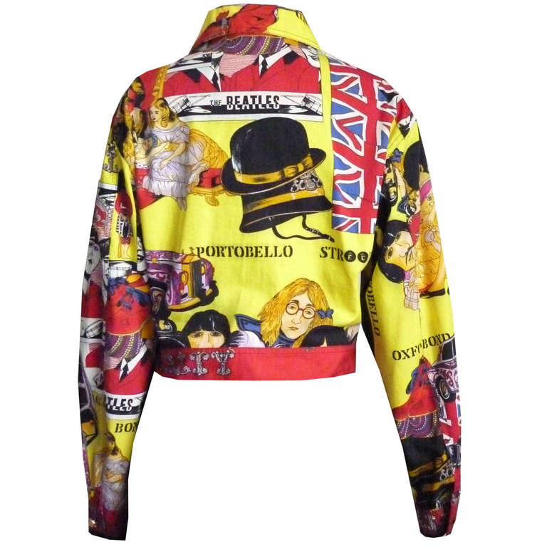 Gianni Versace Rock and Royalty Britannia Print jeans jacket from the Spring/Summer 1995 Versace Jeans Couture collection. The jacket is secured by a series of metal buttons featuring the Medusa and Greca detail.

Marked a Medium.

Manufacturer