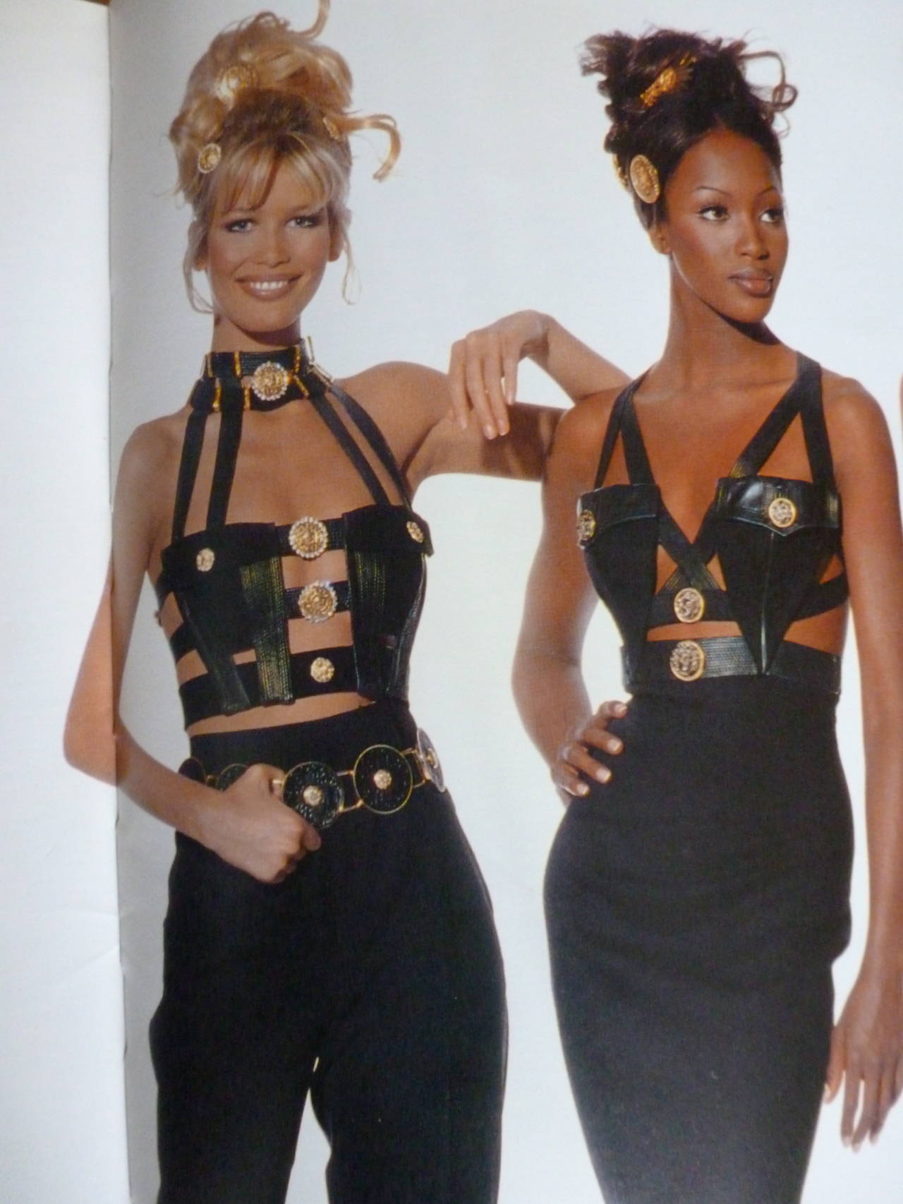 Iconic and very rare Gianni Versace Couture jewelled bondage harness ensemble, featuring a jewelled bondage evening harness bodice and wool crepe skirt. The ensemble from the Fall 1992 collection, featured in the advertising campaign, as modelled by
