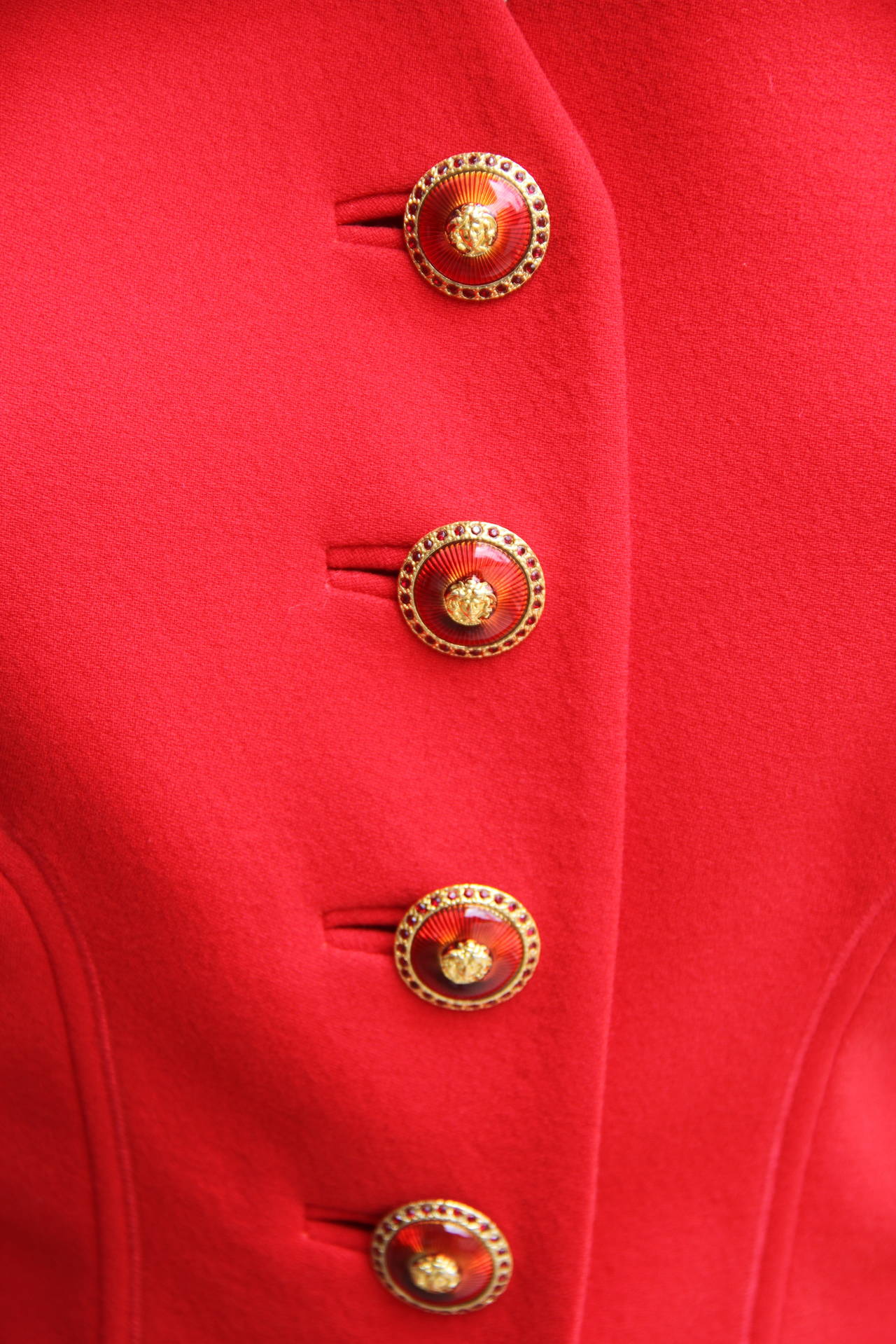 Rare Atelier Versace Nautical collection red wool jersey fitted waistcoat vest from the Spring 1993 Haute Couture collection, shown at The Ritz in Paris.

The waistcoat features a row of gilt metal, strass and ruby paste Medusa head buttons to the