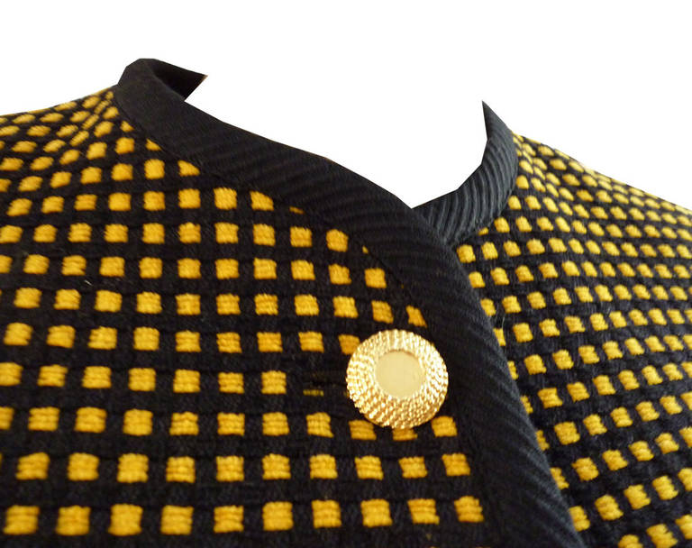 Gianni Versace short gold and black checked short jacket from the Versus Autumn / Winter 1992 collection.

Marked an Italian 40.

Manufacturer - Ittierre S.p.a.