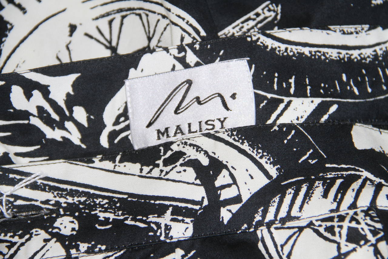A rare Genny Malisy motorcycle print cotton skirt from the Spring 1991 collection.

Marked an Italian size 42.

Fabric content - 100% cotton

Manufacturer - Genny Moda S.p.a.