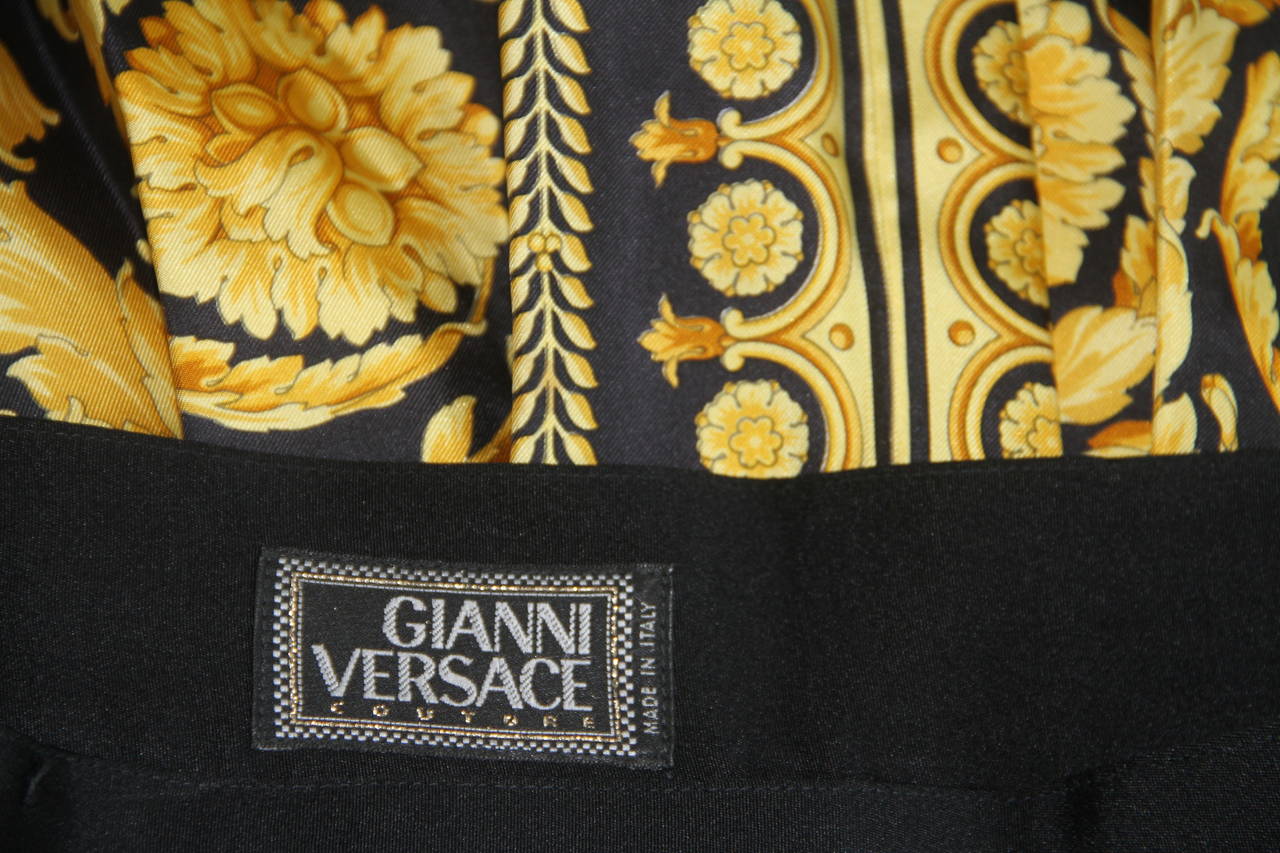 Museum Quality Gianni Versace silk Baroque printed pleated skirt from the Fall 1991 collection.

One of the most iconic skirts from the collection, the skirt was featured in the Herb Ritts advertising campaign.

Marked an Italian size
