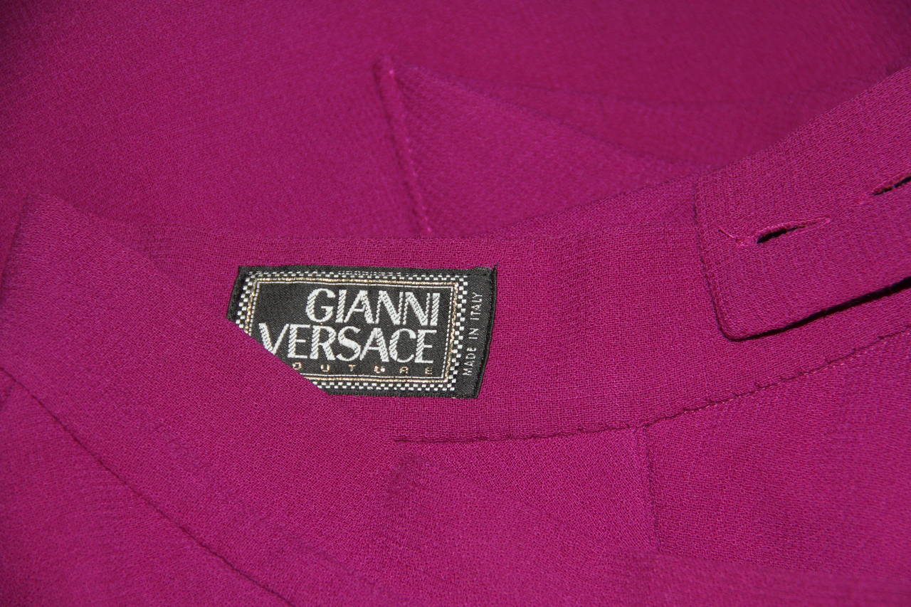 Gianni Versace Origami inspired purple wool crepe skirt from the Fall 1991 collection.

Marked an Italian size 38.

Manufacturer - Alias S.p.a.