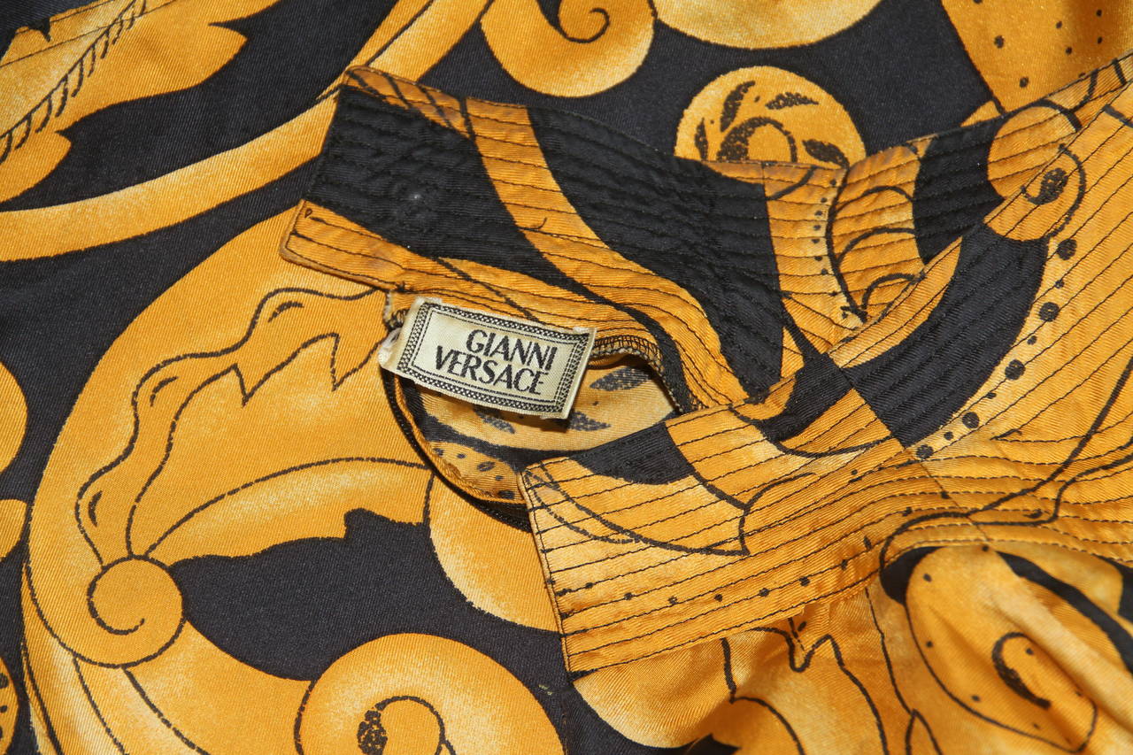 Gianni Versace Baroque printed silk top from the Fall 1991 collection.

Marked an Italian size 38.

Manufacturer - Alias S.p.a.

Fabric content - 100% silk