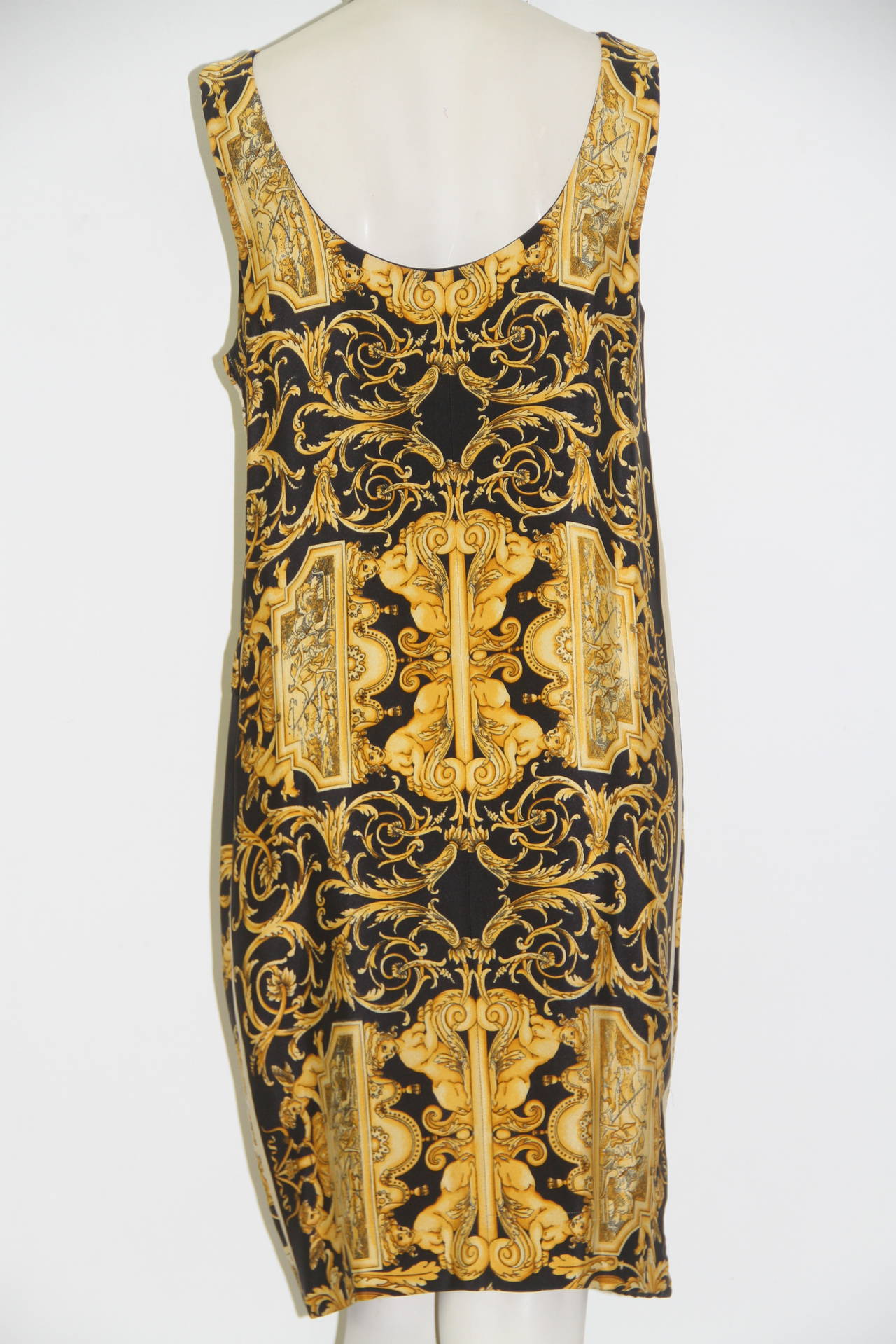 Iconic and rare Gianni Versace Baroque printed silk shift dress from Spring 1992 collection. The dress was featured in the advertising campaign for the collection.

Marked an Italian size 40.

Manufacturer - Alias S.p.a.

Fabric content - 100%
