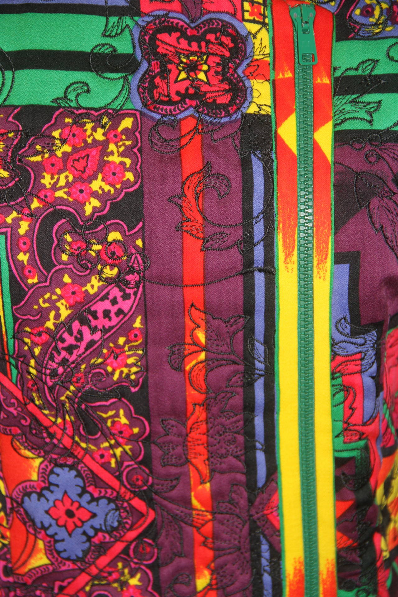 Gianni Versace multi-coloured printed zip front suit from the Fall 1991 collection.

Marked an Italian size 42.

Manufacturer - Alias S.p.a.

Fabric content - 100% wool