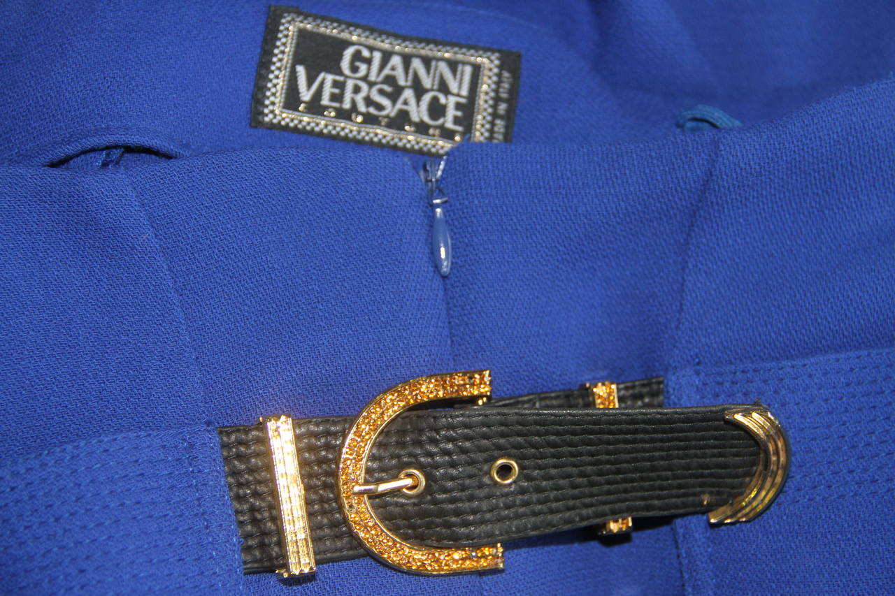 Gianni Versace electric blue bondage buckle and lace-up pants from the Fall 1992 Bondage collection.

The pants feature bondage leather straps with paste detailing to the front and leather and lace-up bondage detailing to the back.

Marked an