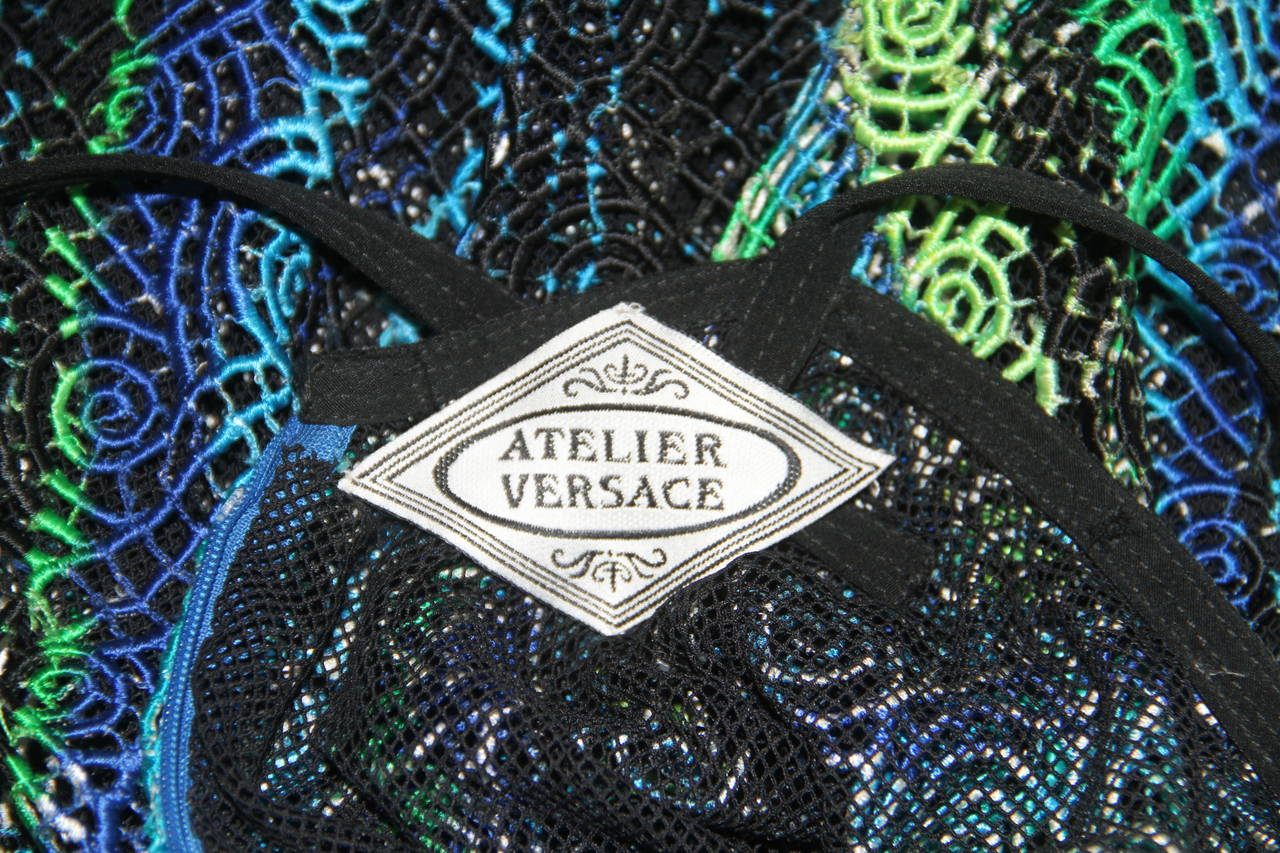 Rare Atelier Versace multi-coloured threaded dress with black net underlay from the Spring 1994 Haute Couture Punk collection, shown at The Ritz, in Paris.

Unmarked, however, sizing is equivalent to an Italian size 40.

Manufacturer - Alias