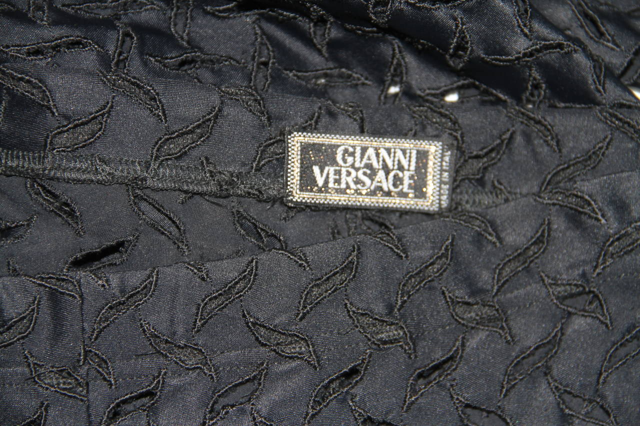Gianni Versace black cut-out leggings from the Spring 1994 Punk collection.

Marked an Italian size 40.

Manufacturer - Alias S.p.a.