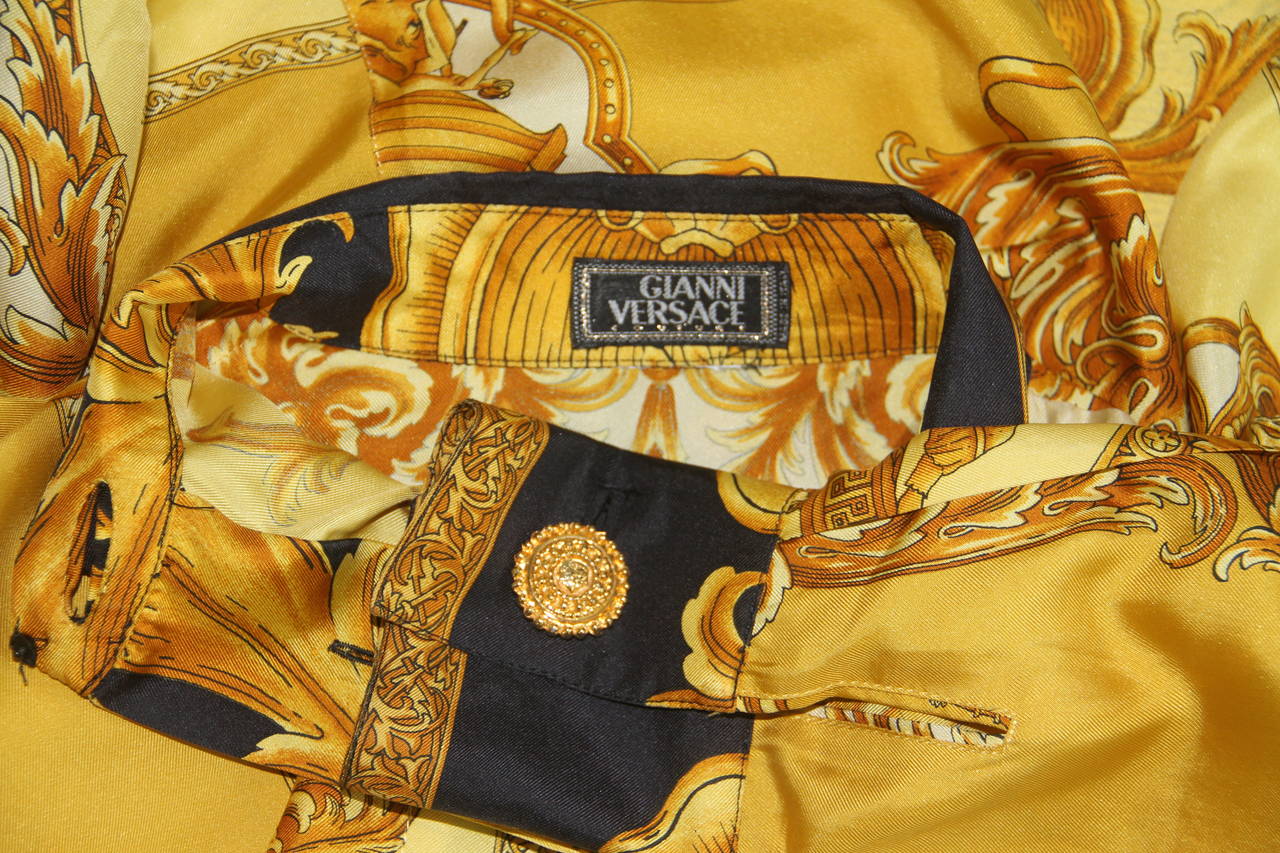 Gianni Versace gold Baroque silk printed blouse from the Fall 1992 Bondage collection.

Marked an Italian size 40.

Manufacturer - Alias S.p.a.

Fabric content - 100% silk