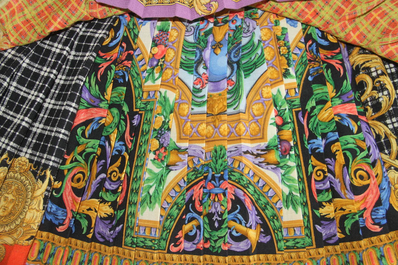 Gianni Versace wool pleated Baroque and tartan printed skirt from the Fall 1992 Bondage collection.

Marked an Italian size 42.

Manufacturer - Alias S.p.a.

Fabric content - 84% wool / 16% nylon
