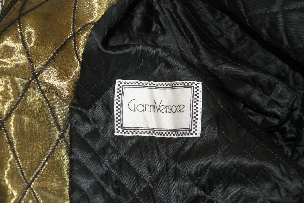 Rare Gianni Versace silk gold metallic embroidered and quilted parka jacket from the Fall 1990 collection.

Marked an Italian size 40.

Manufacturer - Dismi '92 S.p.a.