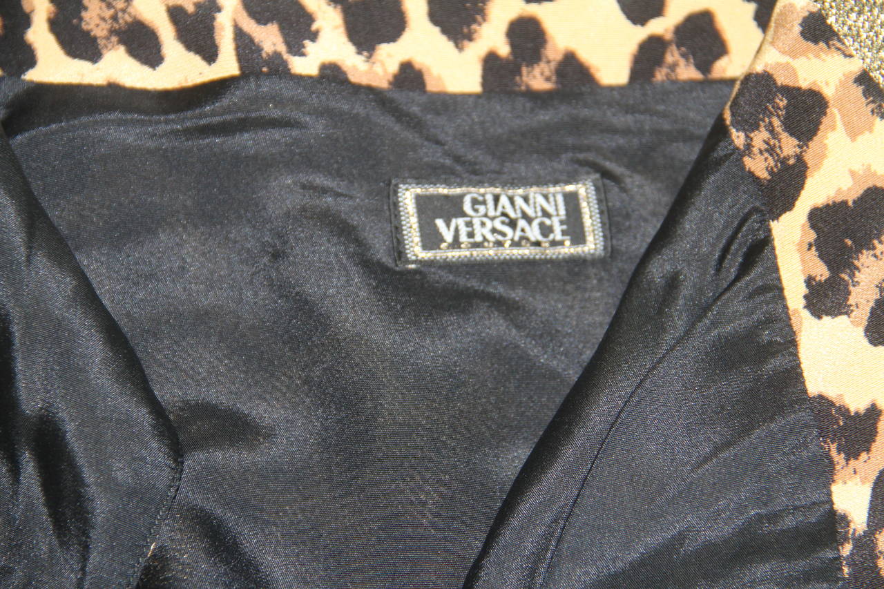 Gianni Versace silk animal printed zip front waistcoat vest, with gold lurex braid edging from the Spring 1992 collection.

Marked an Italian size 42.

Manufacturer - Alias S.p.a.