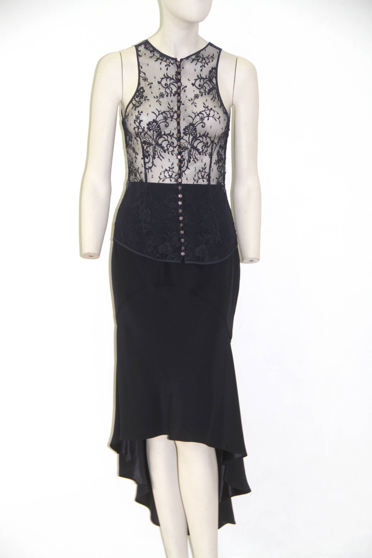 Chloe navy blue silk embroidered lace ensemble, with intricate detailing from the 1990's. 

Unmarked, however, sizing is equivalent to a French size 36.