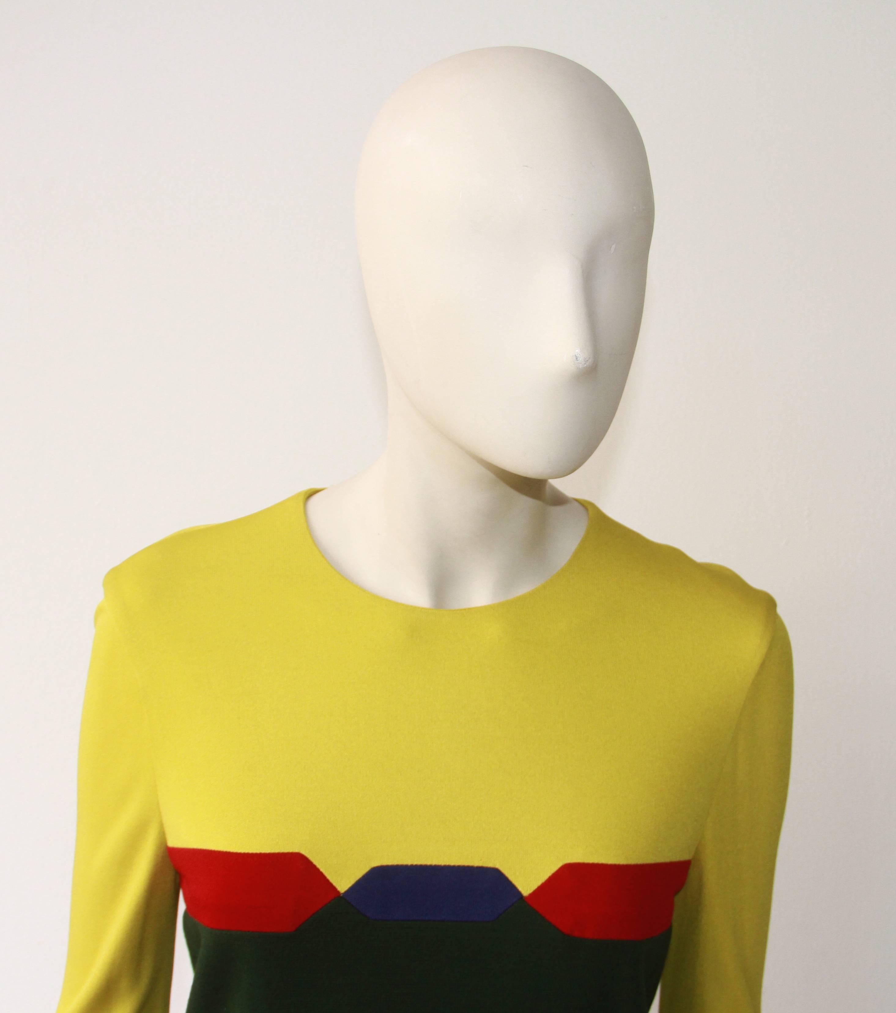Gianni Versace colour-blocked long sleeved dress from the Fall 1997 collection.

Marked an Italian size 40.

Manufacturer - Alias S.p.a.

Fabric content - 48% wool / 41% rayon / 7% acetate / 4% nylon